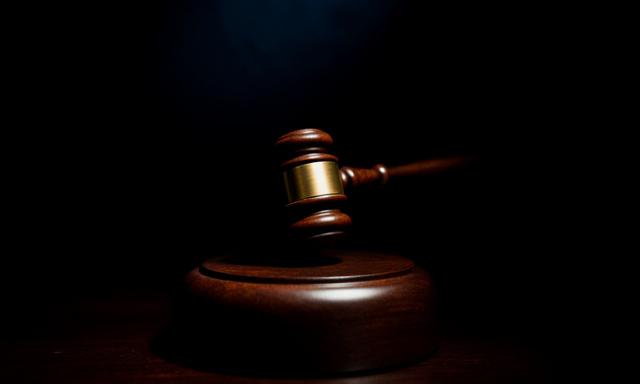 Gavel on a wooden table representing legal remedies